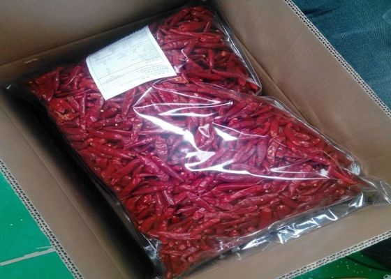 I baccelli rossi dei peperoncini rossi di MUI Tianjin Red Chilies Authentic scelgono l'erba